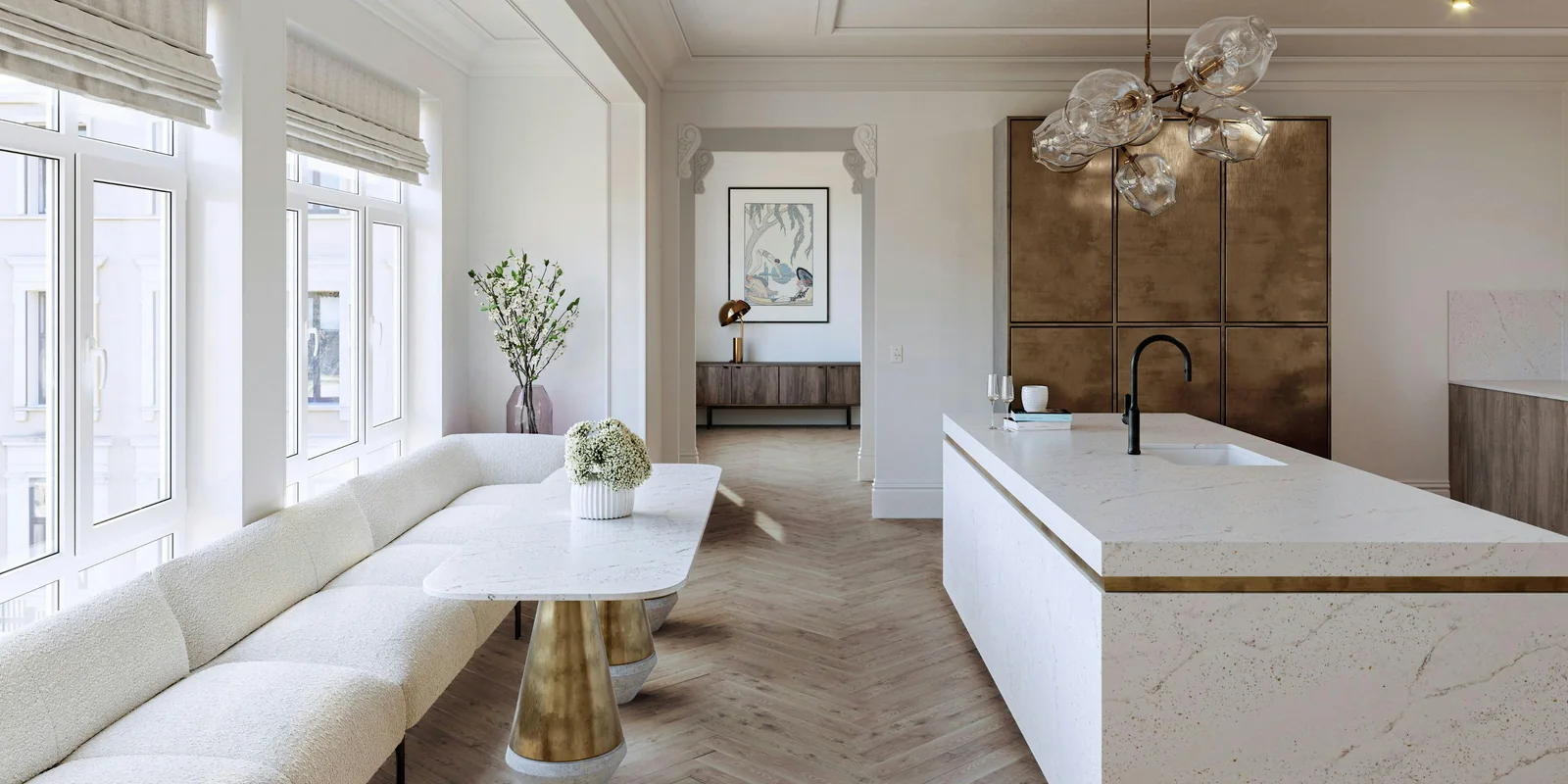 Cuisine lumineuse avec îlot et table clairs en Silestone Eclectic Pearl.
